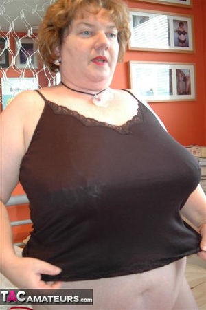 Big breasted fatty shows her massive natural bazookas to the camera - Picture 5
