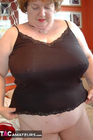 Big breasted fatty shows her massive natural bazookas to the camera - Picture 6