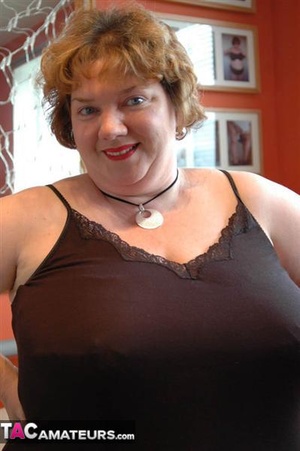 Big breasted fatty shows her massive natural bazookas to the camera - Picture 8