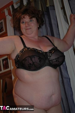 Big breasted fatty shows her massive natural bazookas to the camera - Picture 16