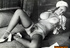 Slut is wearing hot lingerie while teasing with her hairy snatch and her