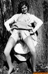 A raunchy whore in pigtails, gets her wet, hairy, pussy fucked bareback