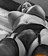 A chubby granny, with big tits, gets her breasts groped from behind, by