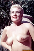 These petite, older, pornstars seductively pose for the camera topless