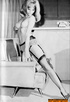 These gorgeous sluts pose seductively in various states of undress in