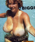 This freckled ginger, with large tits, smiles and poses in a pool