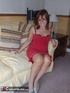brunette milf strips her