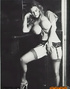 Knockout brunette and blonde in white robe black mesh stockings and bold