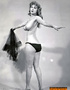 Enchanting couple girls wearing black blazer and nude mesh stockings know
