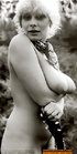 Hunky couple girls wearing black scarf dress and lace underwear taking