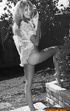 Stunning blonde bitch with a beautiful tan removes her bikini showing