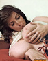 Curvy brunette bitch with massive tits rides a huge cock and catches its