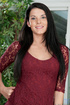 long-haired brunette gets naked