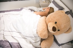 Blonde slut shows her long legs having fun with a stuffed bear. - Picture 13
