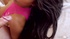 Tanned bitch with gray eyes and pink lingerie lays over her white bed