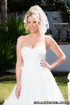 Beautiful blonde bride, with vail,  super sexy garters and white high
