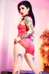 cute tattooed brunette with