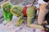 Naughty horny chick in covered in green paint takes hobo’s cock in mouth