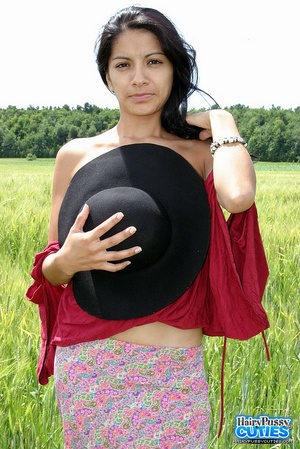 Dark hair cutie in black hat and red top - Picture 2