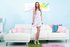 Red haired angel takes off her dress to expose her nice slim body