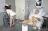 Naughty brunette nurse in white stockings sneaks a fuck with the patient
