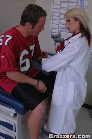 Naughty blonde doctor teases and fucks an injured football star - Picture 2