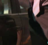 Mature blonde in pink top and black miniskirt toying her coochie in the