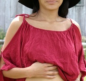 Gorgeous babe displays her hot body by the river wearing her black hat,