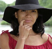 Gorgeous babe displays her hot body by the river wearing her black hat,