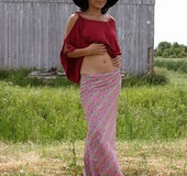 Gorgeous babe displays her hot body by the river wearing her black hat,