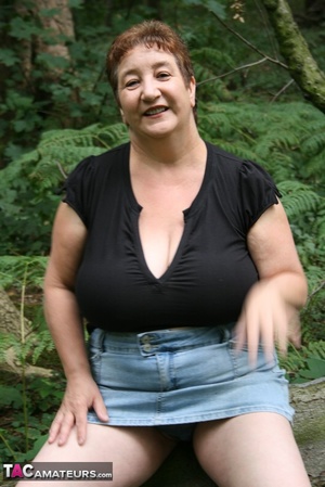 Mature BBW displays her plus size body in black shirt, jeans skirt and blue high heels then shows her extra large boobs in the woods. - XXXonXXX - Pic 17