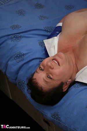Hot granny nurse in blue and white uniform, white stockings and high heels rubs her monster boobs on her old patient's dick then sucks it before she lets him lick her wide open pussy as she lays down on a blue bed. - XXXonXXX - Pic 19