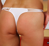 Black haired milf with pierced belly posing in white undies and flashing