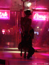 Asian hottie with smoking hot body dances on stage before she peels off