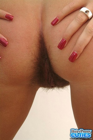 Short haired brunette with red nails and - Picture 12