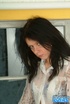 Black haired gal with big breast and hairy snatch slowly taking off her