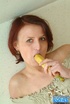 Brunette milf with small tits toying her bushy fuck hole with banana on