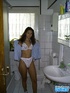 Hairy pussy brunette with perky tits gets cum covered after taking a shower