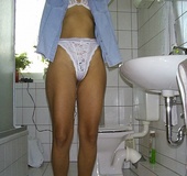 Small tits brunette took off white lingerie and taking a shower before
