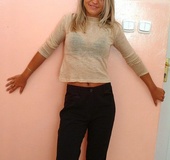 Blonde lass with big melons taking off her black underwear and pants before