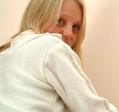 Green eyed blonde in blue top and green panty undressing and exposing