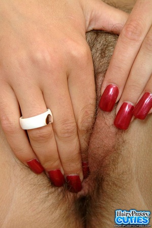 Pierced belly brunette in black bra and seethrough panty stripteasing on the red chair and touching her hairy fuck hole - XXXonXXX - Pic 5