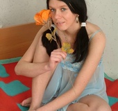Black haired lass with blue eyes slowly taking off blue lingerie and fingering
