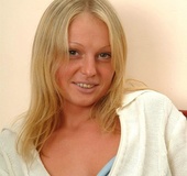 Busty blonde taking off green panty and grey miniskirt before teasing