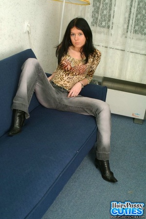 Black haired gf in tight jeans and red lingerie strips on the blue couch and fingers her bushy snatch - XXXonXXX - Pic 1