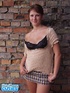 Redhead babe with big naturals sheds black underwear and miniskirt to