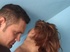 Redhead with purple make-up brutally drilled on a bed
