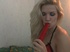 Two blondes in red train with big dildos for gape