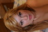 wavy-haired brunette lays the