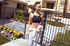 Pretty young asian girl with small tits takes a shower outside